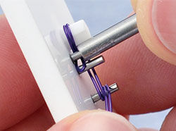 Pusher tube being used on jig peg